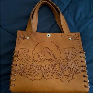 Brown Leather Tote Bag with Skull Design and Taylor